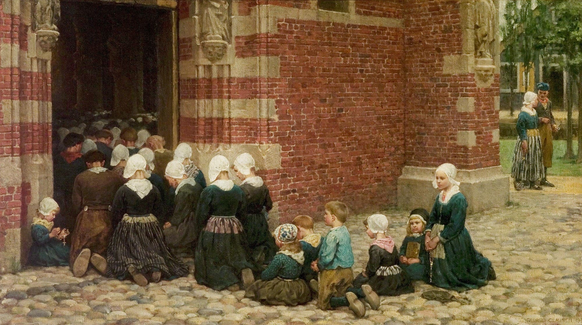 Outside the open door of a red brick church, a crowd of fishing folk in white caps and dark dress kneel on the cobblestones at prayer, the congregation filling the doorway behind them, while children sit and kneel in a row along the wall and a couple stand watching in the street beyond.