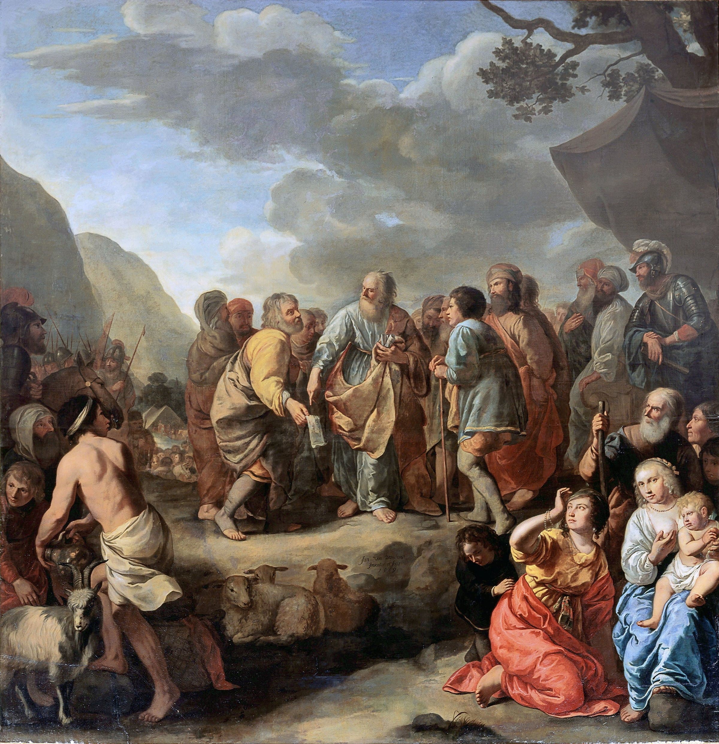 A crowd gathers on a rocky plain before a tent, where an old man in a yellow robe points to a paper as he speaks to a white-bearded leader in a pale blue robe, with soldiers, women, children and sheep around them.