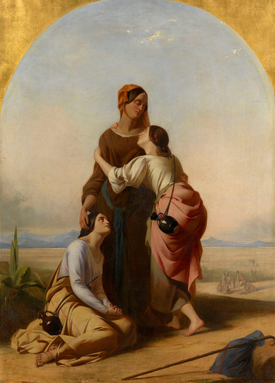An arched painting of an older woman in a brown dress and orange headscarf standing with her eyes lowered on a desert road, one young woman embracing her and looking up at her face, a second young woman sitting at her feet looking up, with a staff and a bundle on the ground and a caravan in the distance.