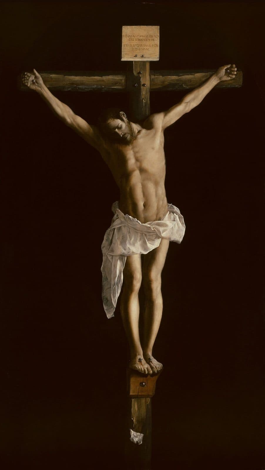 A painting of Jesus nailed by the hands and feet to a rough wooden cross against a black ground, His head bowed to one side and a white cloth about His waist, under a placard lettered in Greek and Latin, with a small slip of paper fixed to the foot of the cross.