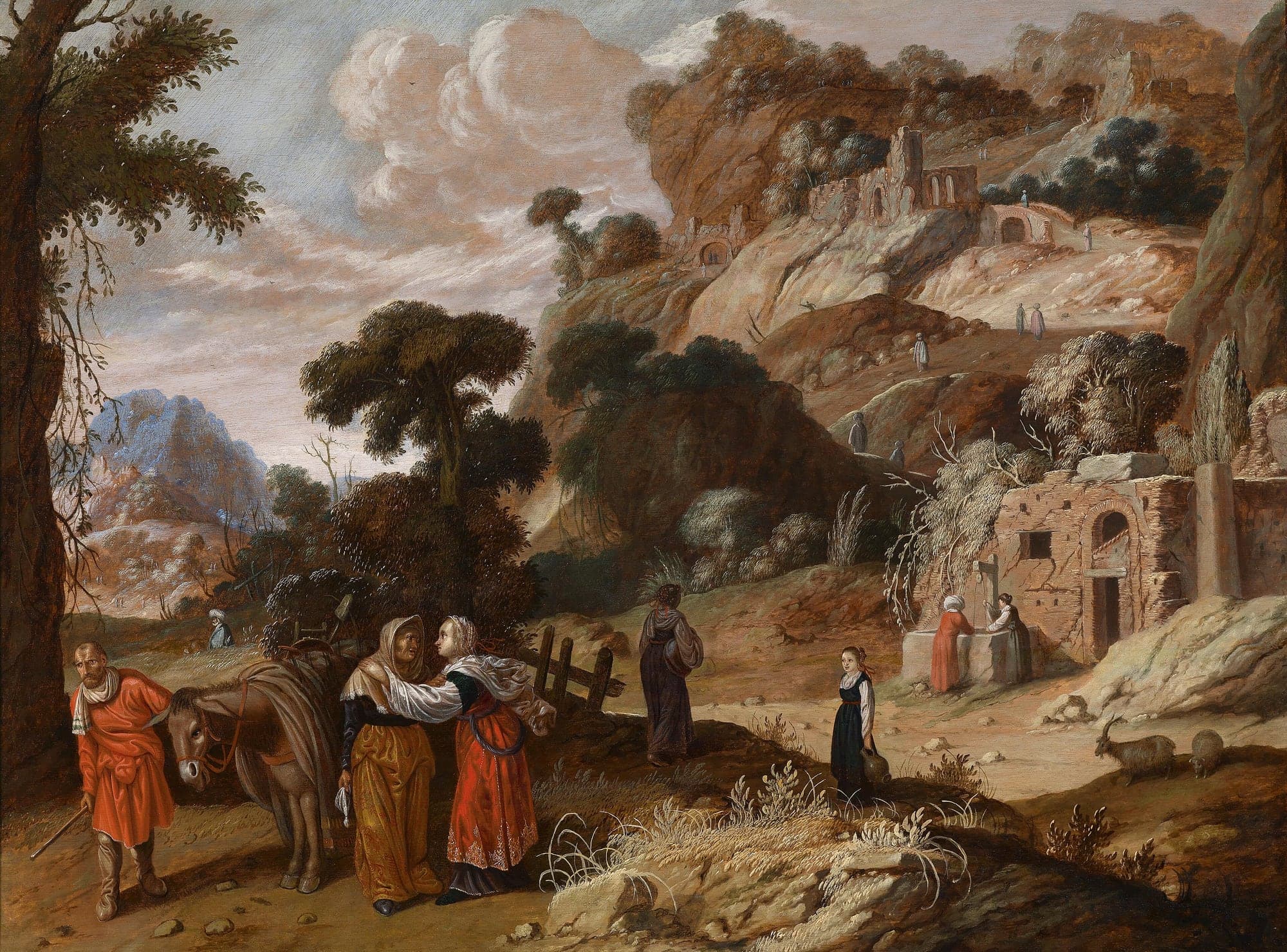 On a road through a rocky landscape a young woman in a red dress embraces an old woman in a yellow robe and hood beside a loaded donkey led by a man in red. Another young woman walks away up the road toward a well and a ruined house.