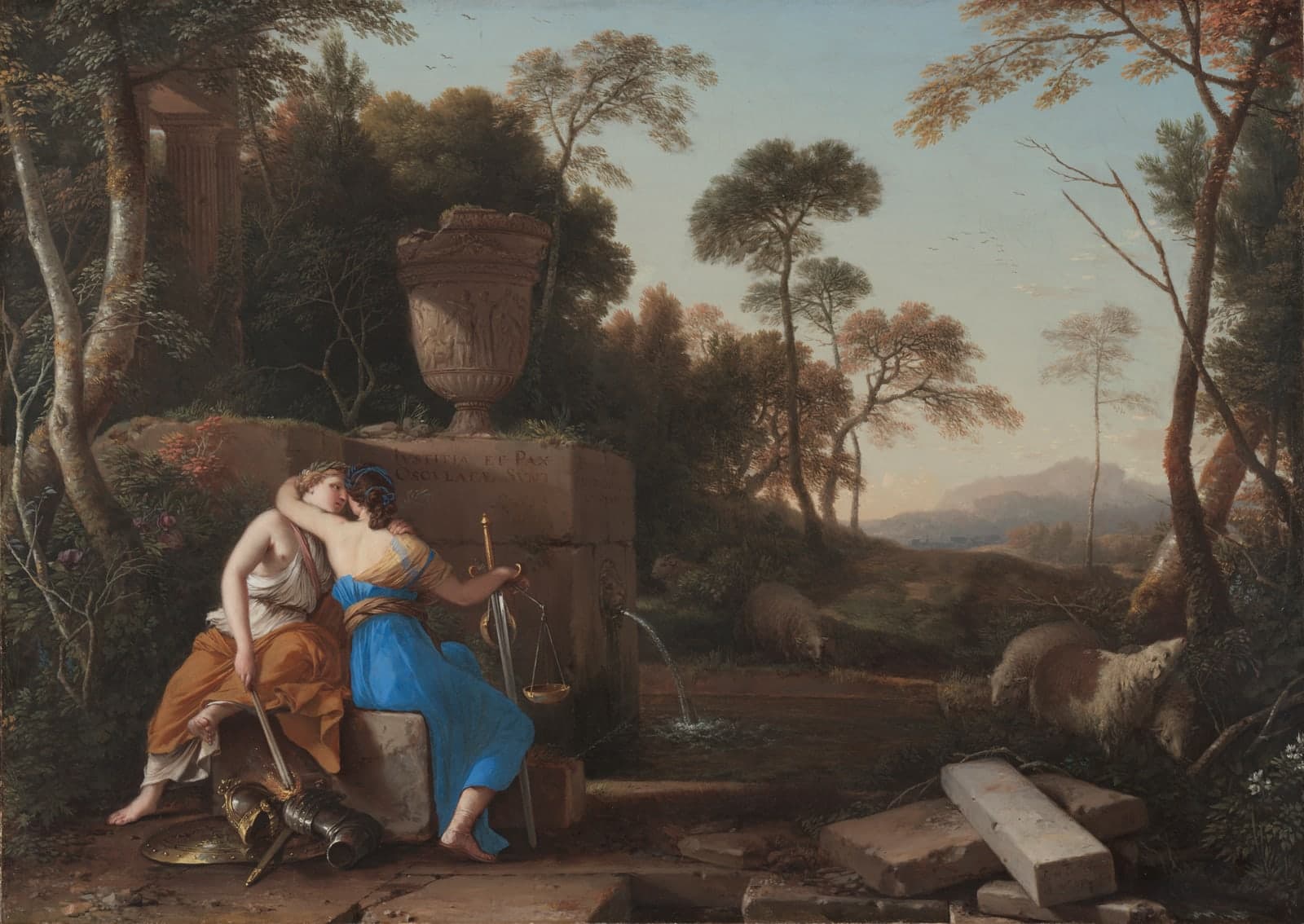 Two women in gold and blue robes embrace and kiss beside a stone fountain carved with a Latin line, one holding a sword and a pair of scales, with armour on the ground, sheep at the water and a wooded valley beyond.