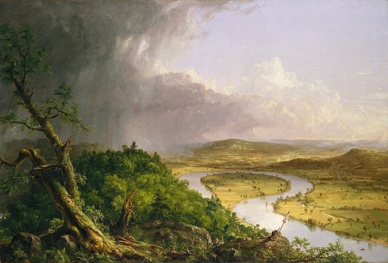 A dark storm cloud trails rain over a wooded hilltop with a broken tree, while sunlit farm fields lie along a river that bends in a wide loop below.