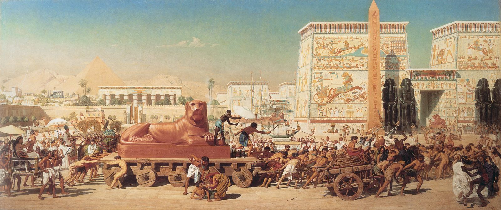 Israelite slaves haul a colossal red stone lion on a wheeled sledge past painted temple gateways and an obelisk, with overseers raising whips, an official carried under parasols on the left and pyramids in the distance