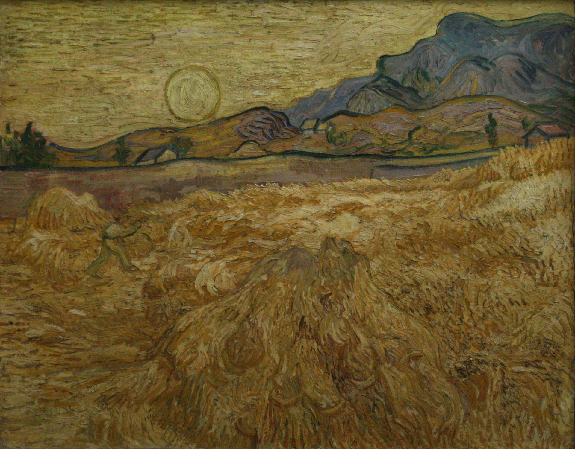 Wheat Field with Reaper and Sun. Vincent van Gogh, Late June - early September 1889. own photo in the Kröller-Müller museum. Public domain.
